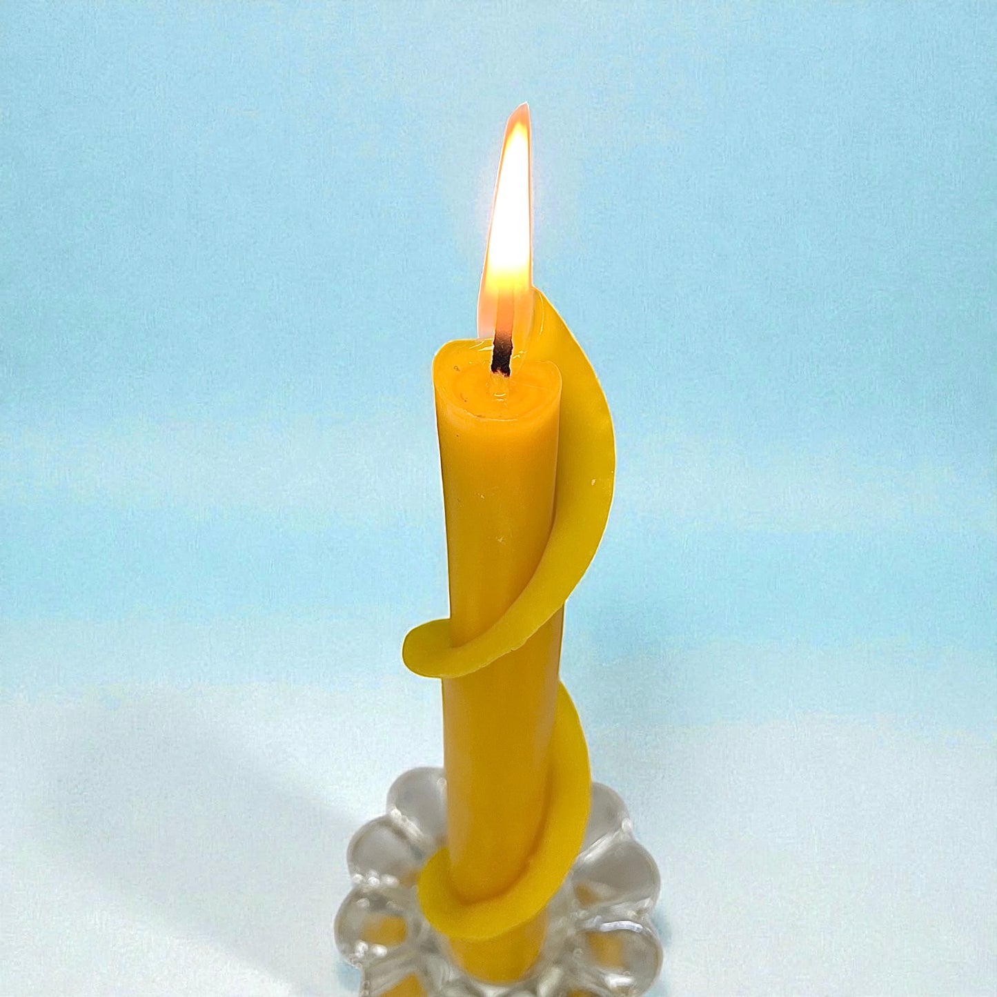 A set of two hand rolled pure beeswax spiral taper candles