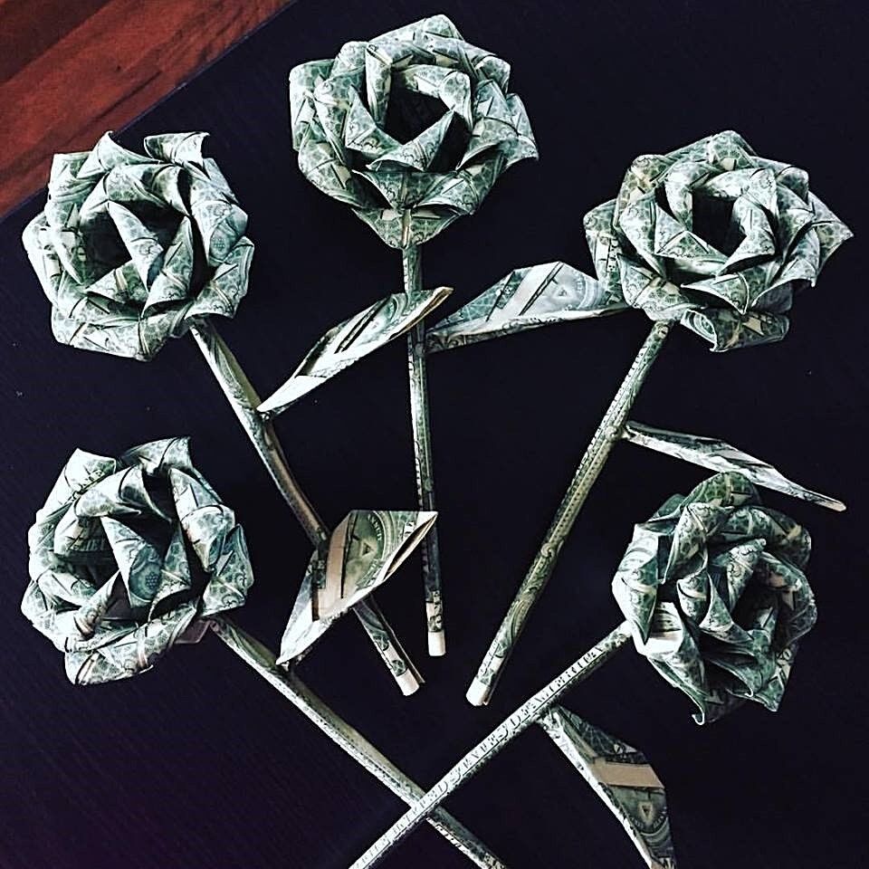 origami money rose made with 10 $1 bills