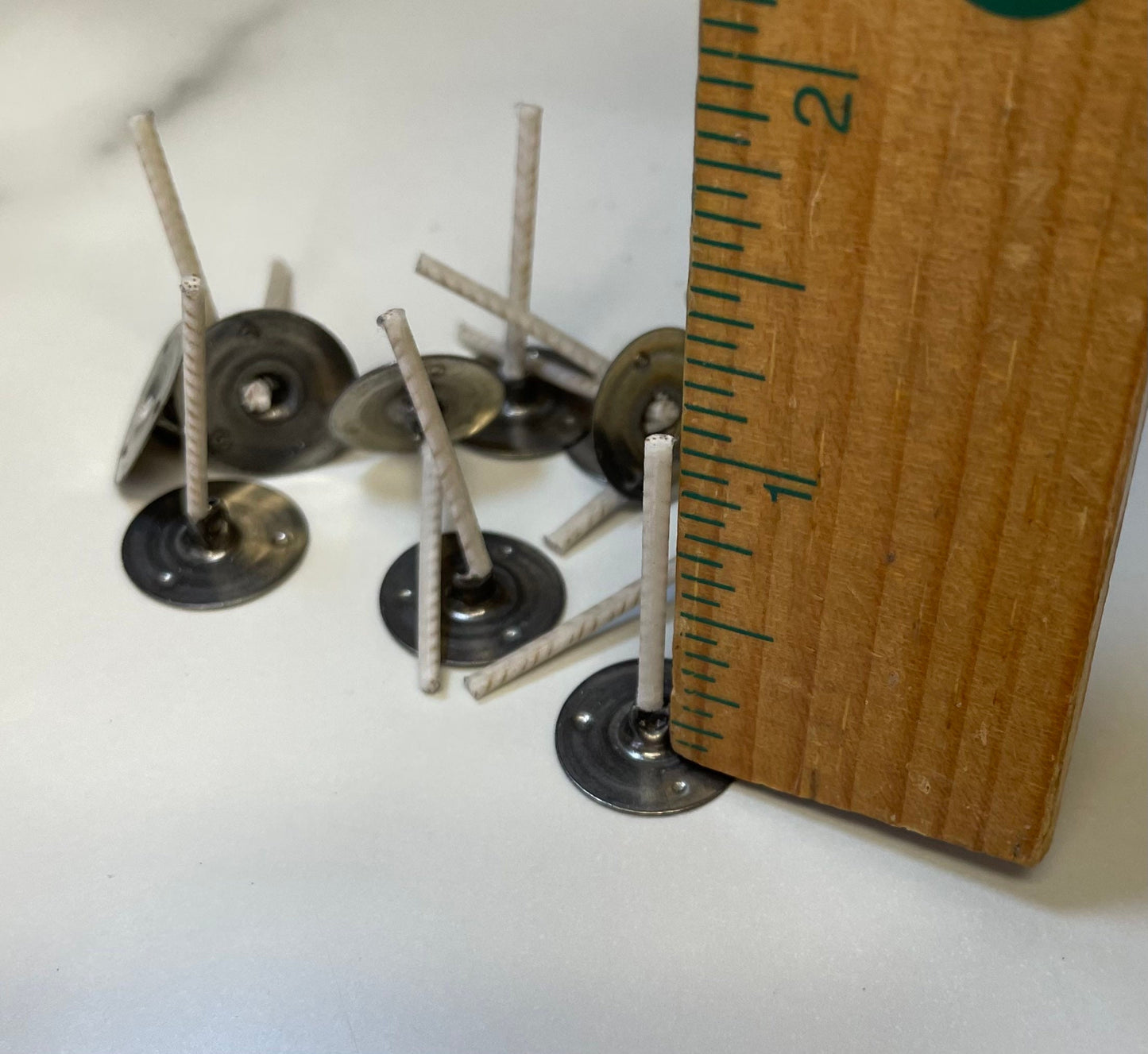A dozen (12) wicks for beeswax tea light candles - tealight candle wicks - ready to use - pretabbed