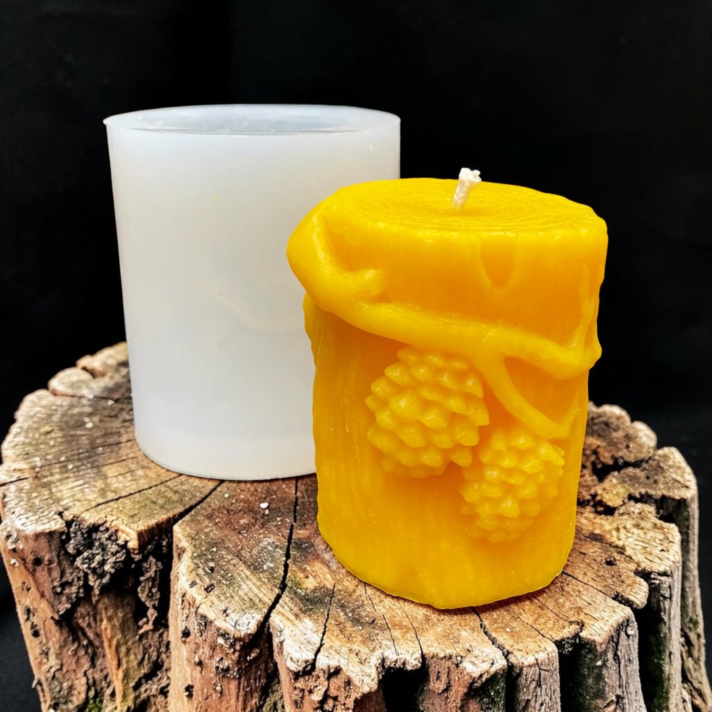 Silicone pillar candle mold designed with pine cones on a tree stump 3.5” x 3”