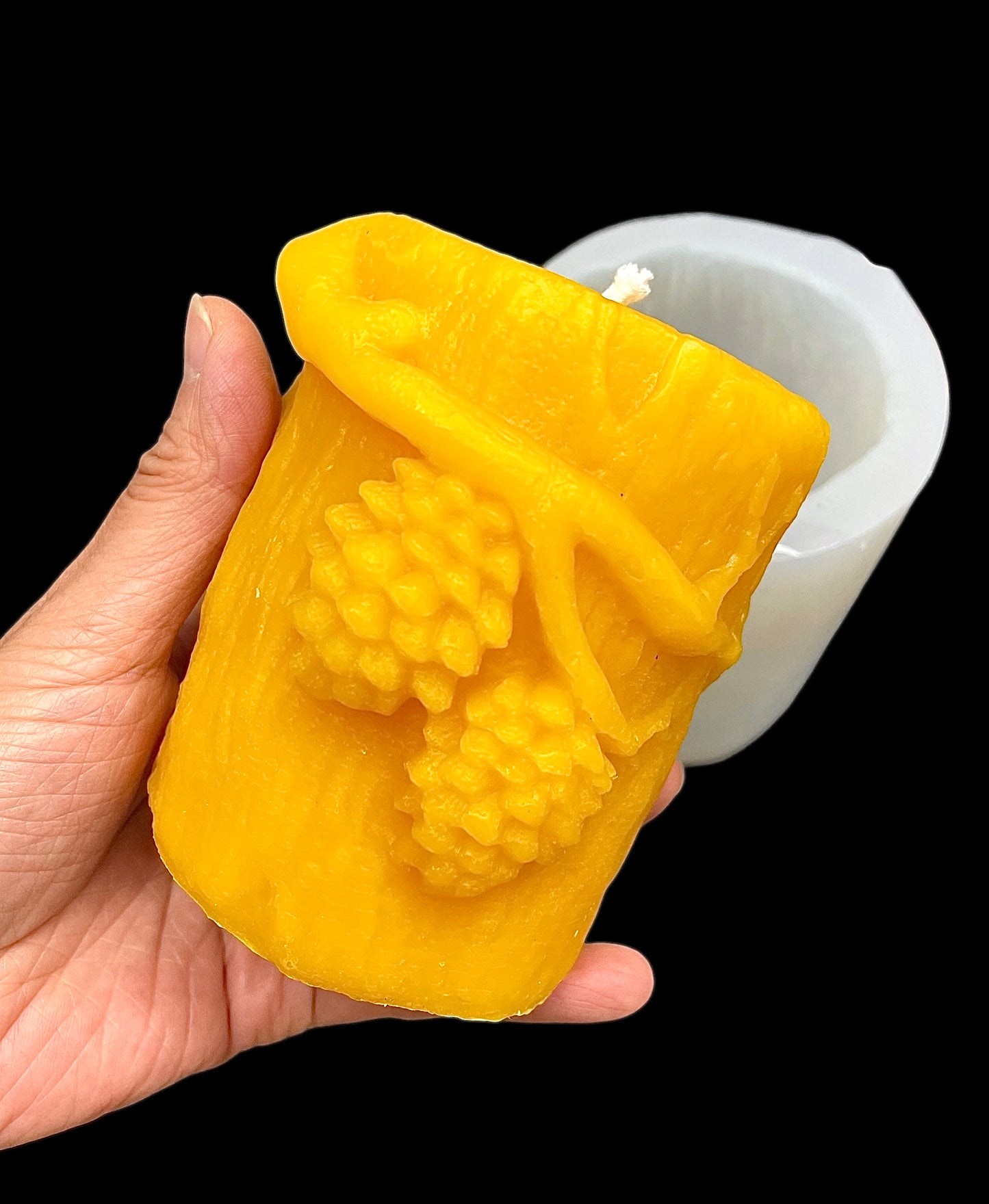 Silicone pillar candle mold designed with pine cones on a tree stump 3.5” x 3”