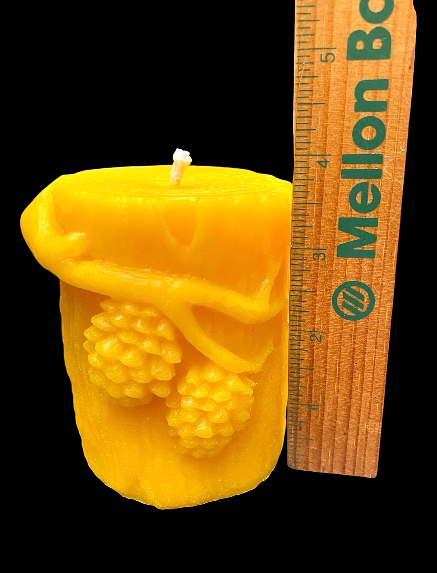 Silicone pillar candle mold designed with pine cones on a tree stump 3.5” x 3”