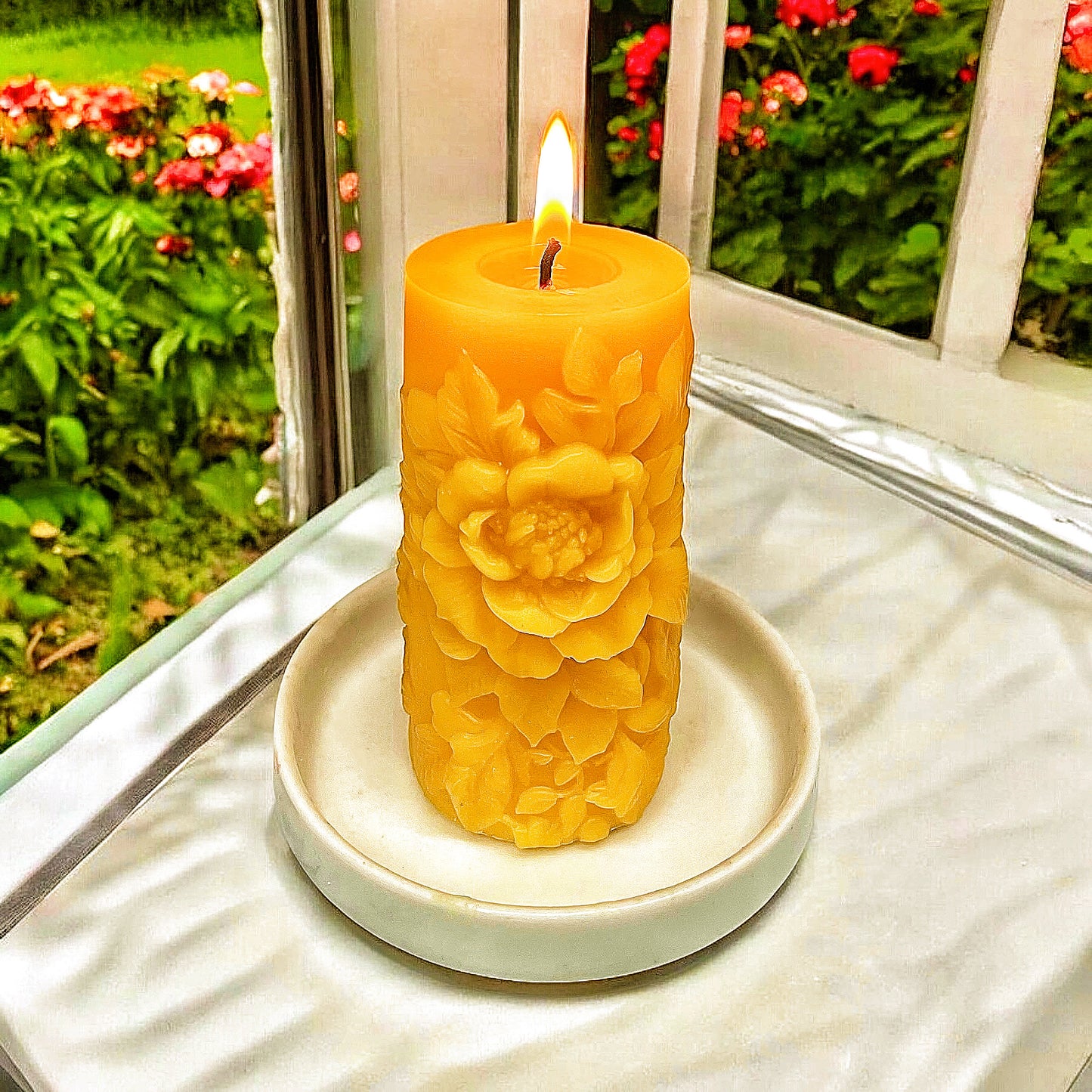 Handcrafted pure beeswax pillar candle designed with peony flowers