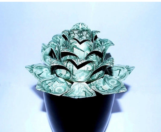 Money origami lotus flower made with 12 $1 bills
