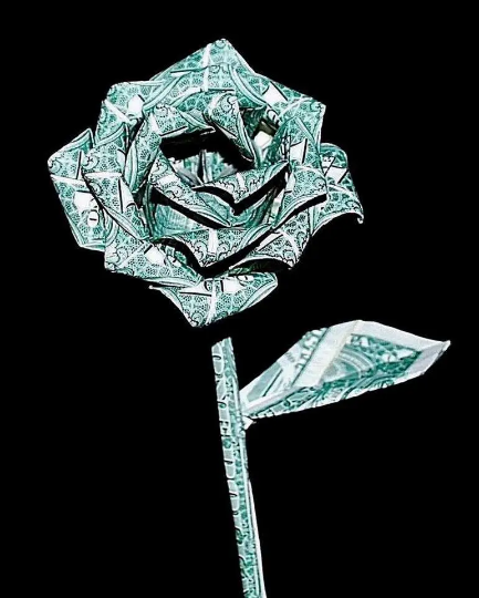 origami money rose made with 10 $1 bills
